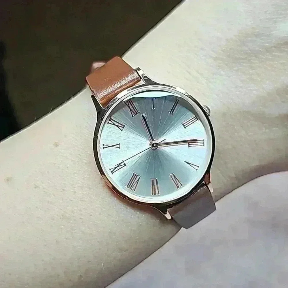 Satiny Silver Round Faced Watch with Rose Gold Case and Brown Band